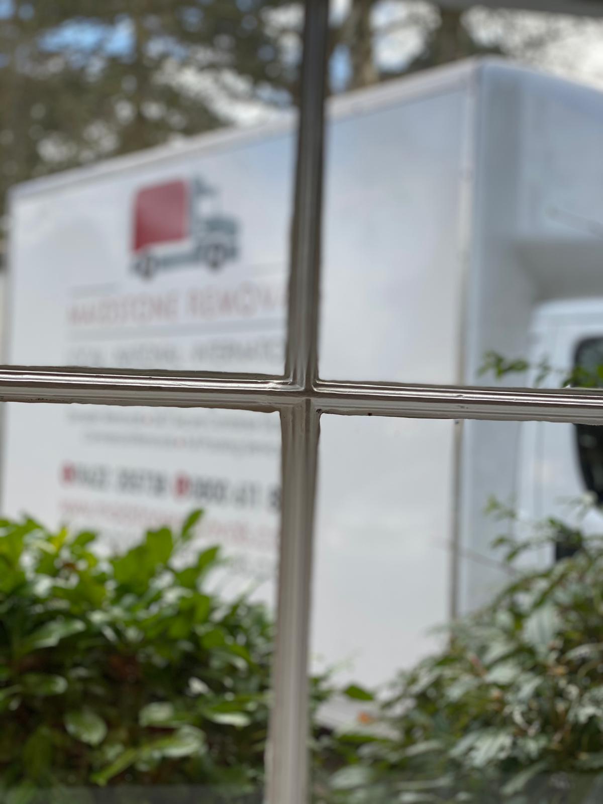 Maidstone Removals - house removals and relocations in Kent looking through windows at van