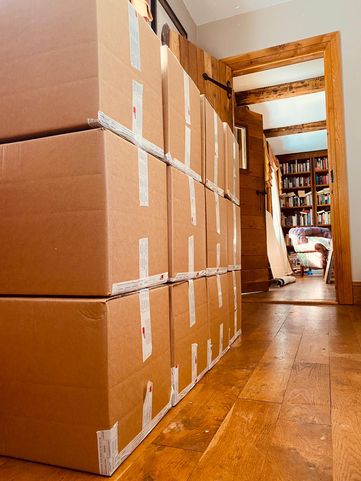 WhatsApp Image 2021-03-17 at 20.22.38 (1) Maidstone Removals - house removals and relocations in Kent boxes in hallway